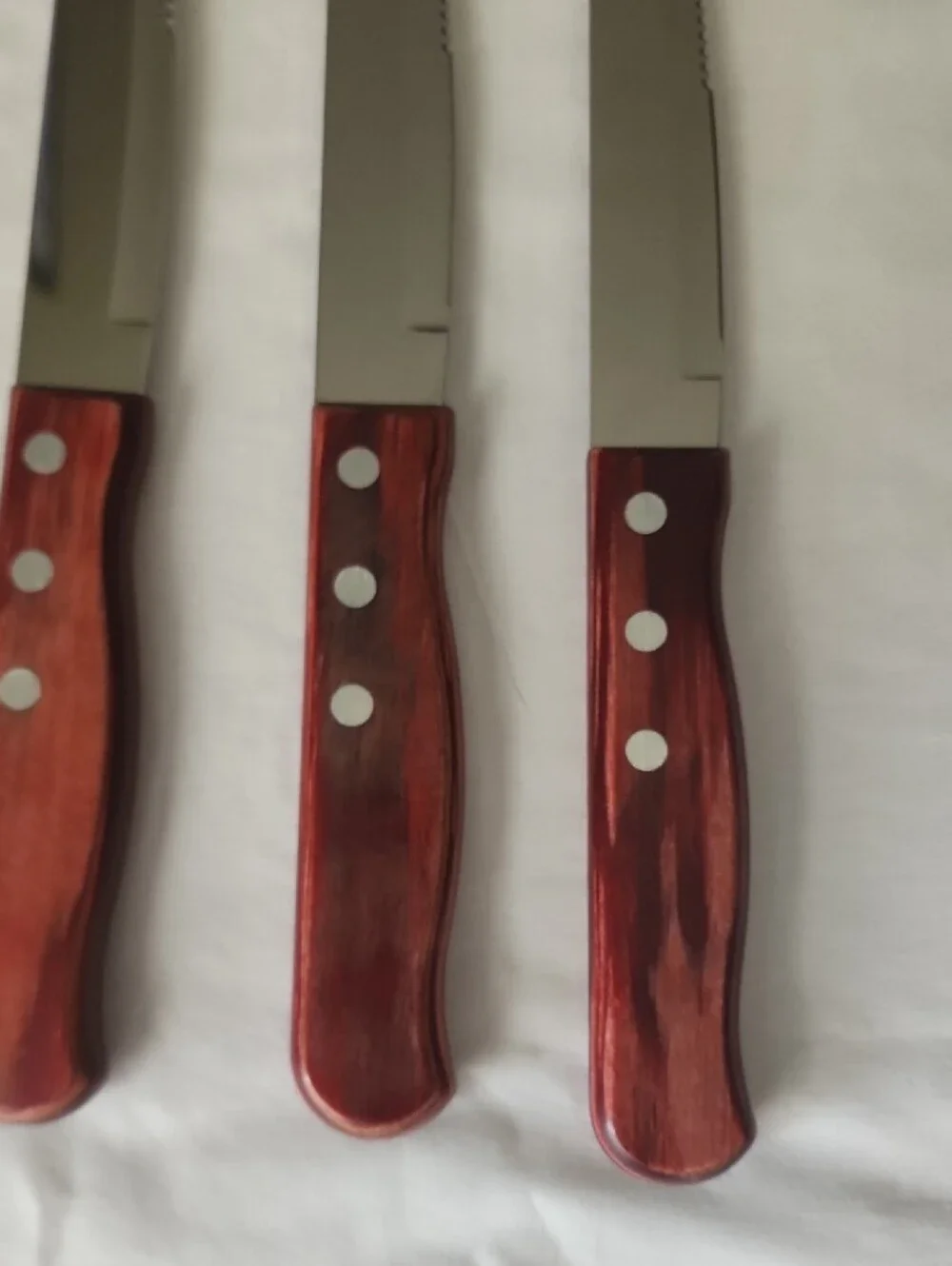 Taramonita Serrated Porterhouse Steak Knife Set - Red Wood Handles (4) Rounded